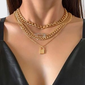 Gold layered necklace. Set of 4.